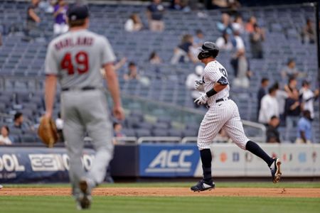 New York Yankees' Jose Trevino (39) drops his bat after hitting an RBI  single to score Oswaldo Cabrera during the fourth inning of a baseball game  against the Boston Red Sox, Sunday