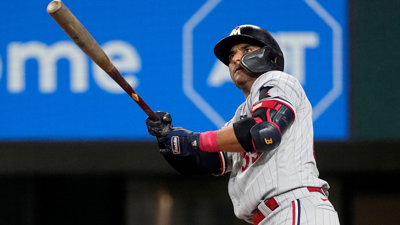 Twins rally to beat sliding Rangers 9-7 in 10 innings