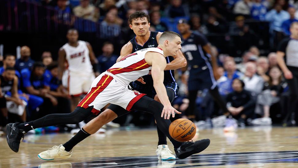 Miami Heat guard Tyler Herro is defended by Orlando Magic forward Tristan da Silva during the second half of Thursday night's game.