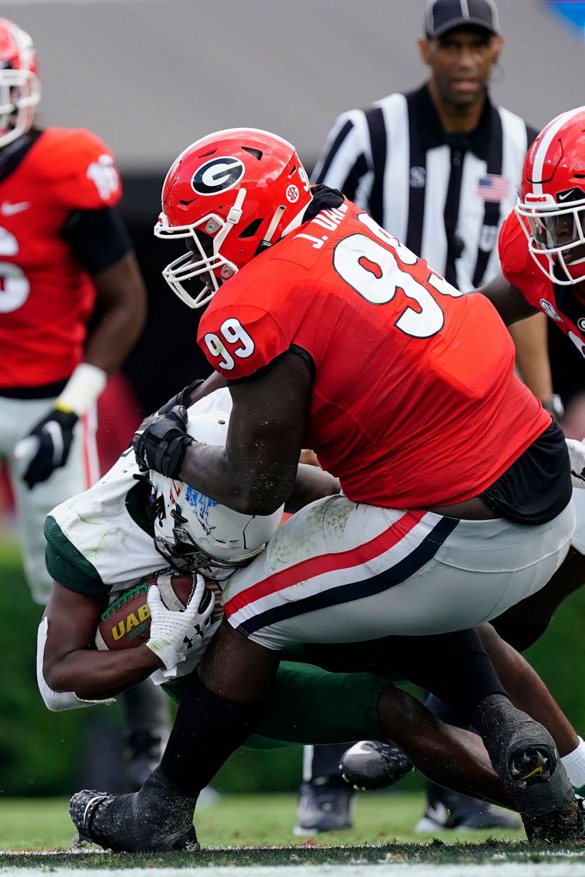 Football cleats clearance for defensive linemen