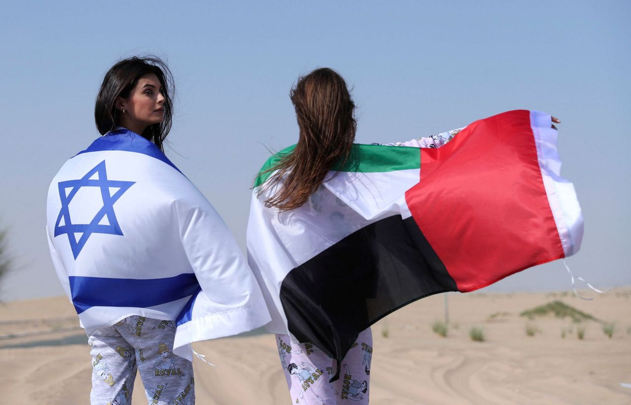 Model diplomacy: Israeli waves flag in UAE pajama photoshoot