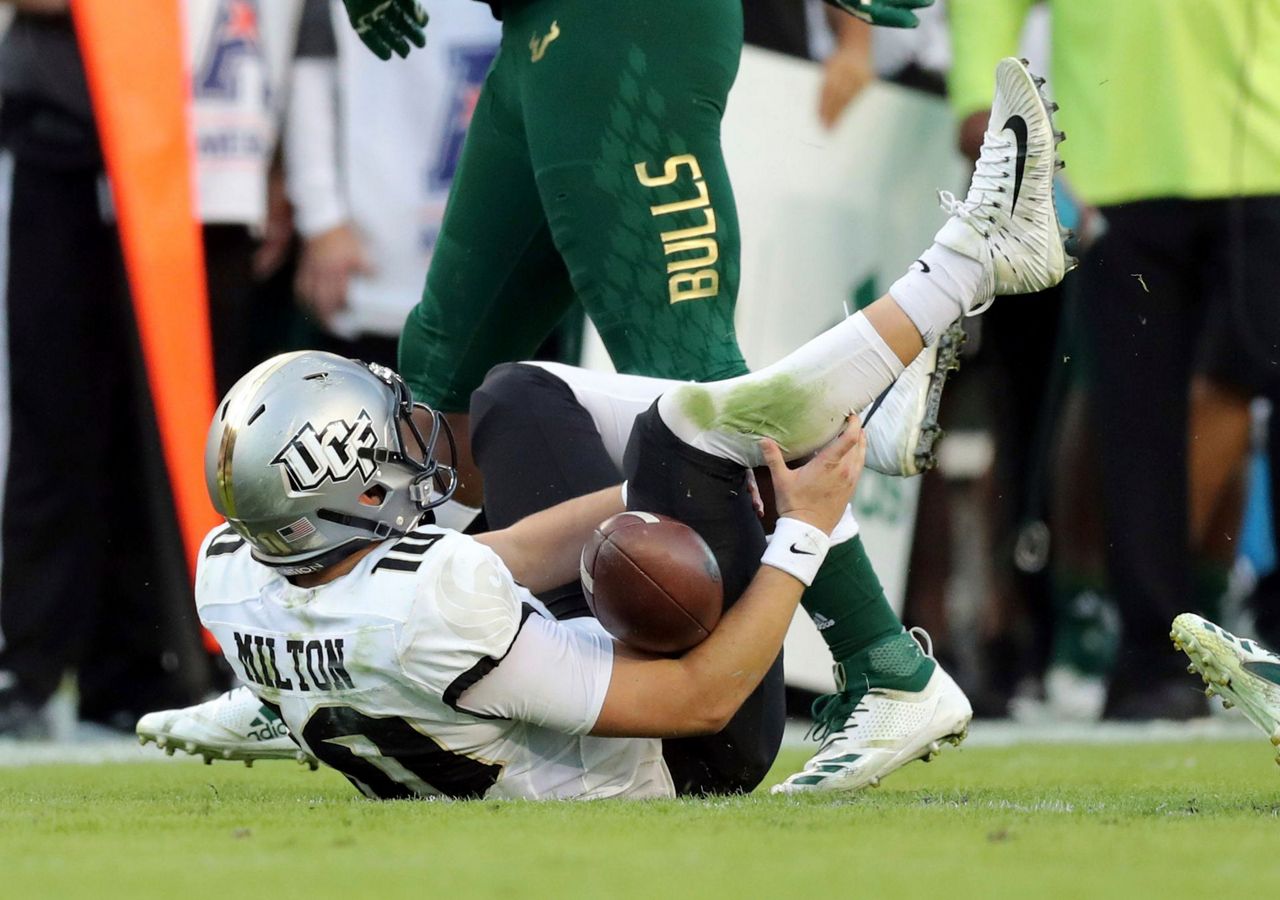 No. 8 UCF remains unbeaten, but loses QB Milton in 3810 win