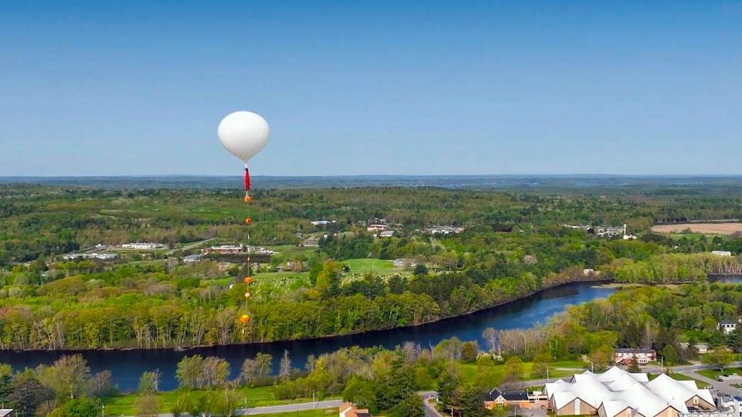 Members of the High Altitude Ballooning program at the University of Maine at Orono launch a data-collection balloon in May. The program will be conducting a launch during the total solar eclipse on April 8. (University of Maine)