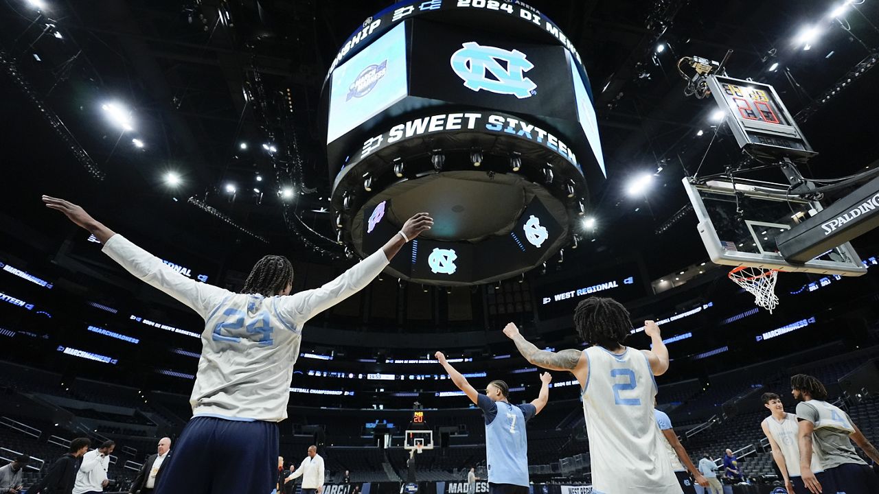 North Carolina players warm up during practice ahead of their Sweet Sixteen college basketball game in the NCAA tournament Wednesday, March 27, 2024, in Los Angeles. North Carolina plays Alabama Thursday. (AP Photo/Ashley Landis)