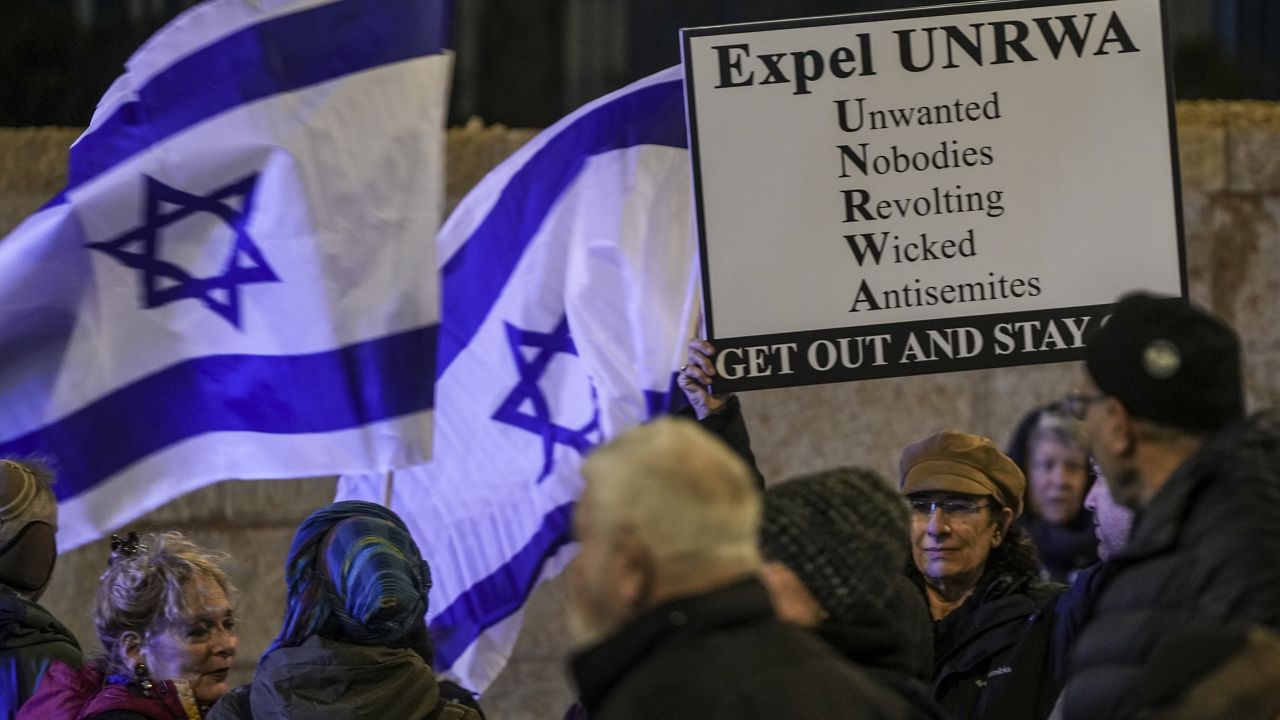 People protest against aid agency known as UNRWA in Jerusalem, Monday, Feb. 5, 2024. UNRWA's Commissioner-General Philippe Lazzarini requested an independent review of the agency following Israeli allegations that 12 of its 13,000 Gaza staff participated in Hamas' Oct. 7 attacks in southern Israel, which led to the current war. More than a dozen countries suspended aid to UNRWA because of the allegations, and Lazzarini warned that without new funding UNRWA could cease operations in late February. (AP Photo/Mahmoud Illean)