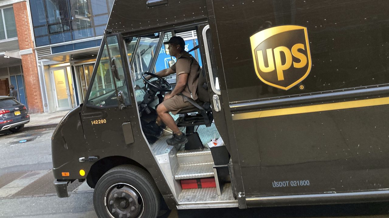 ups driver making a delivery