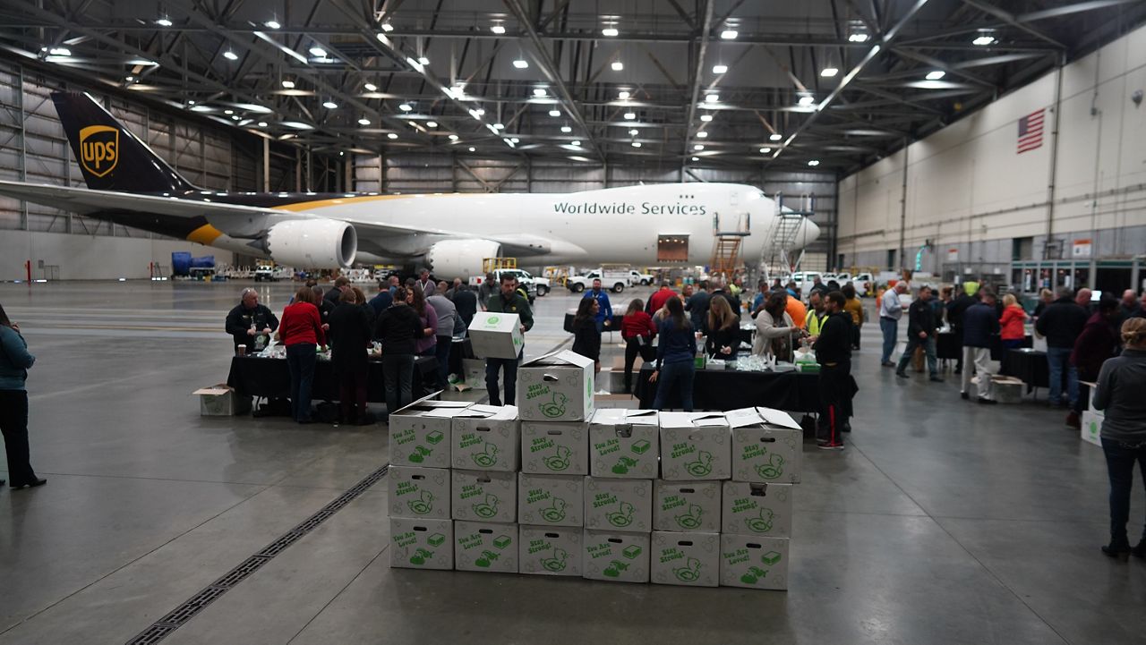 UPS Worldport employees, volunteers assemble hygiene kits