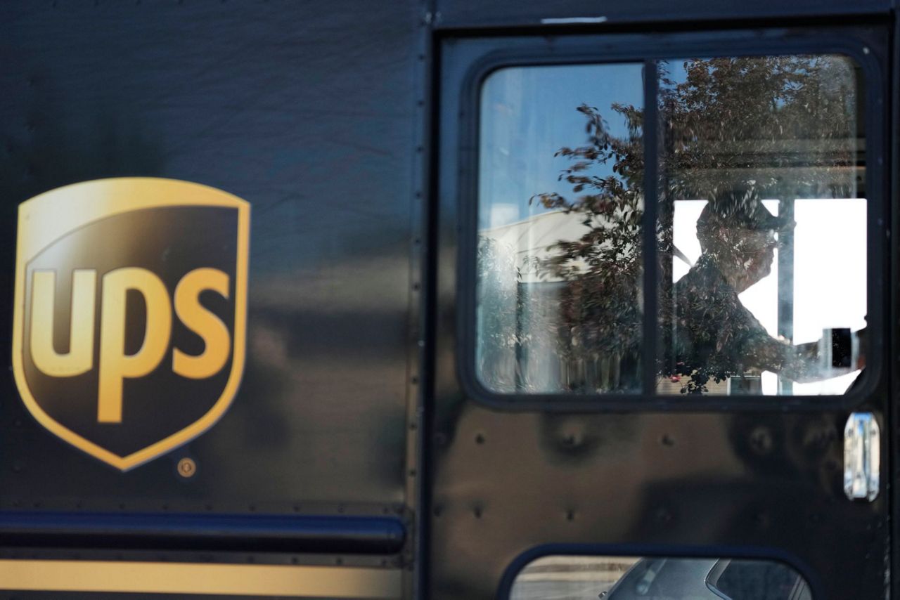 Unionized UPS workers vote to authorize a strike in highstakes