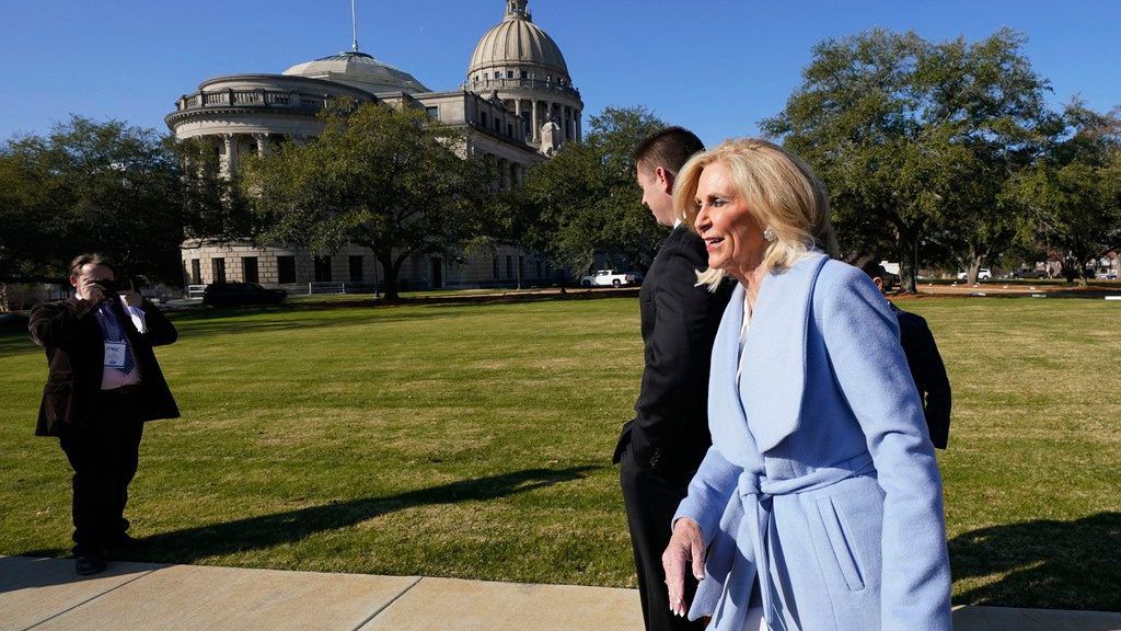 Mississippi Attorney General Lynn Fitch walks past the Mississippi State Capitol as the Capitol Police respond to a bomb threat at the statehouse and the Mississippi Supreme Court building in Jackson, Miss., Thursday morning, Jan. 4, 2024. (AP Photo/Rogelio V. Solis)