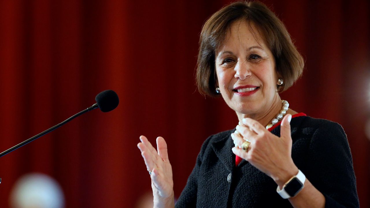 Carol Folt speaks after being named as University of Southern California's 12th president at Town & Gown of USC building in Los Angeles, Wednesday, March 20, 2019. (AP Photo/Damian Dovarganes)