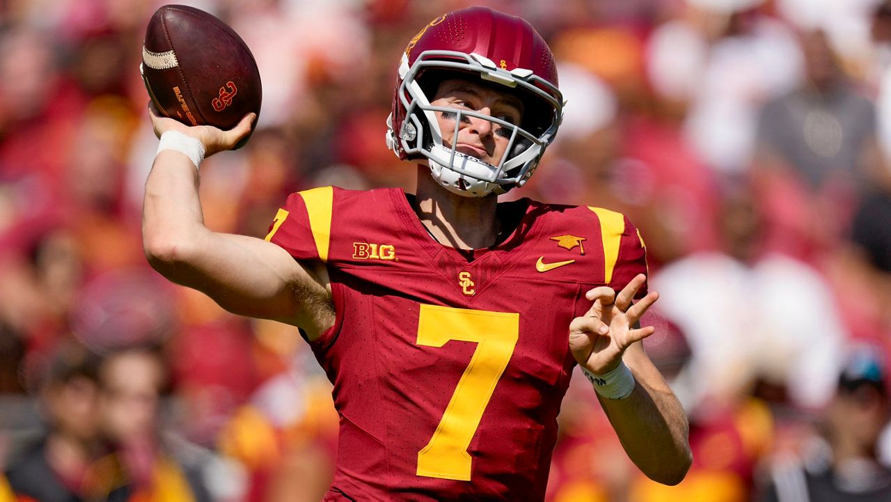 Southern California quarterback Miller Moss passes during the first half of an NCAA college football game against Wisconsin, Saturday, Sept. 28, 2024, in Los Angeles. (AP Photo/Mark J. Terrill)