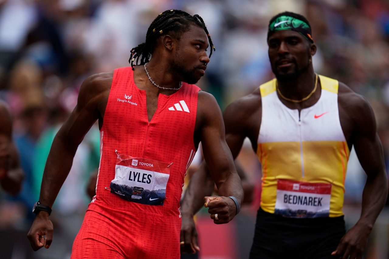 Contact on the track, as Lyles shoved by Bednarek after his win in 200