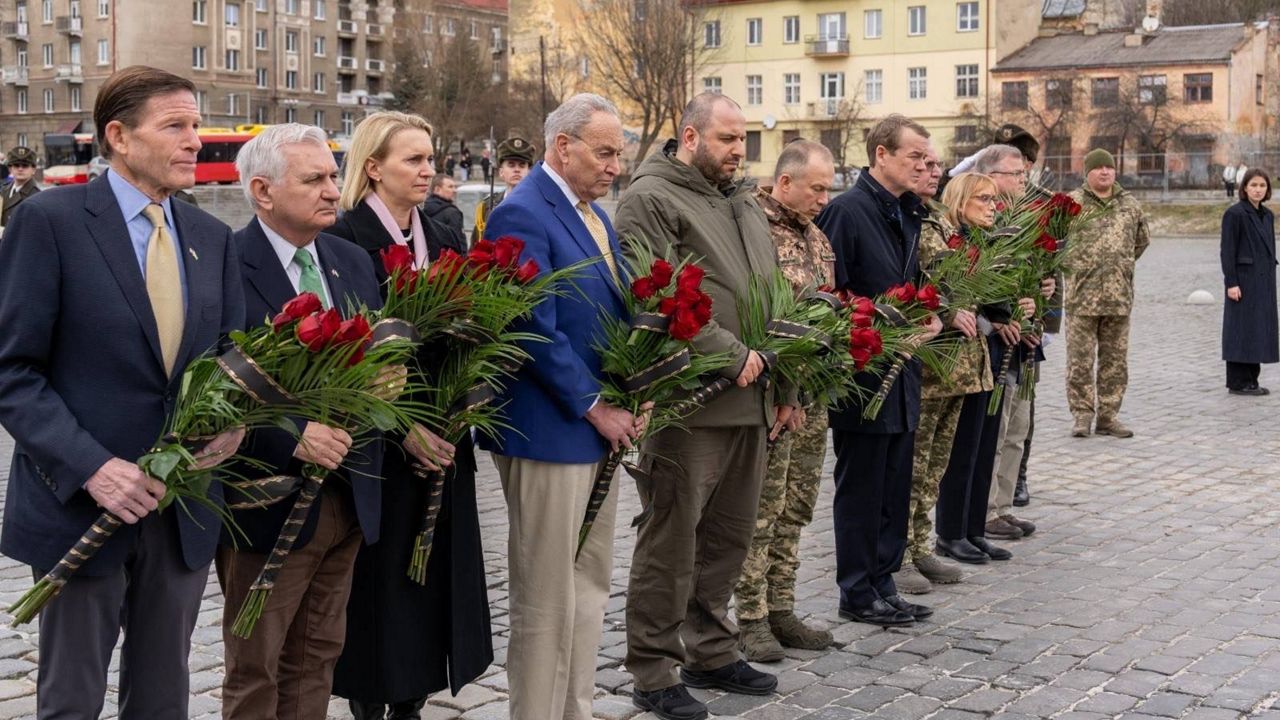 Senate Majority Leader Chuck Schumer, D-N.Y., joined by a delegation of Democratic U.S. senators, take part in a ceremony to honor Ukrainian soldiers who died fighting against Russia. (Twitter / United States Ambassador to Ukraine)
