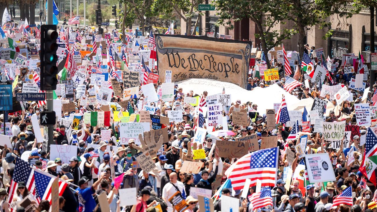 Demonstrators march Saturday, June 14, 2025, in Los Angeles. (AP Photo/Noah Berger)