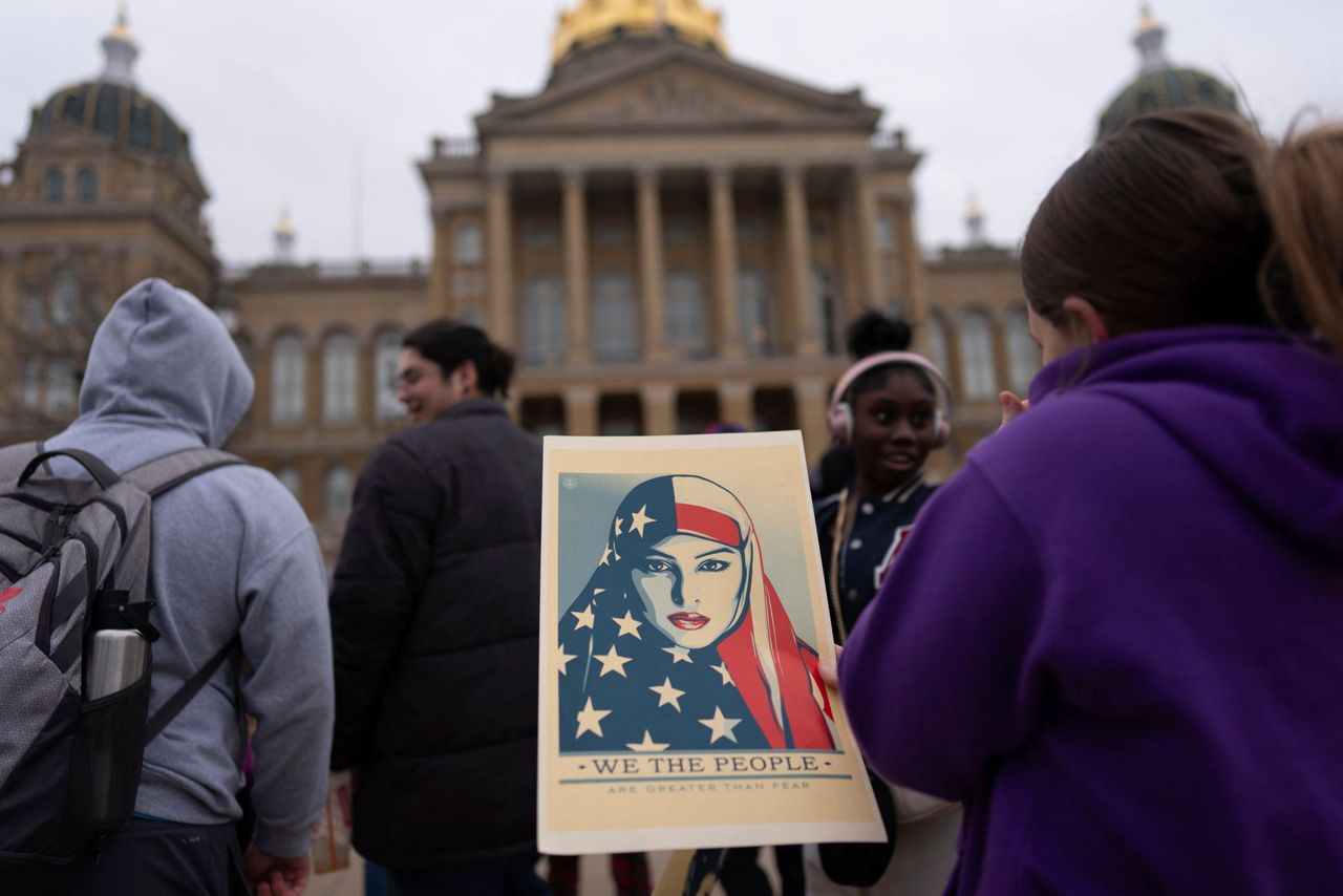 Students rally at the Iowa Capitol days after Perry school shooting