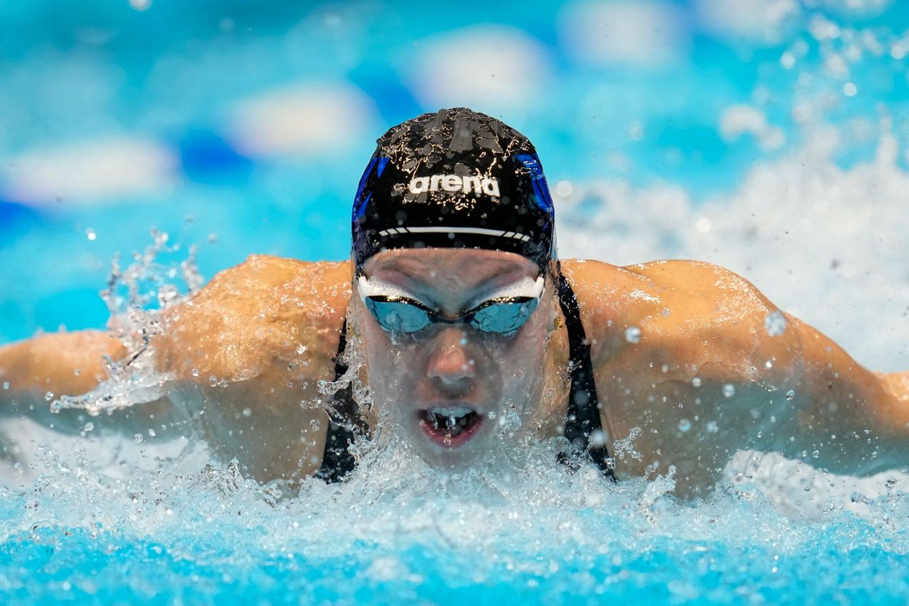 Gretchen Walsh sets a world record in the 100-meter butterfly at the U ...