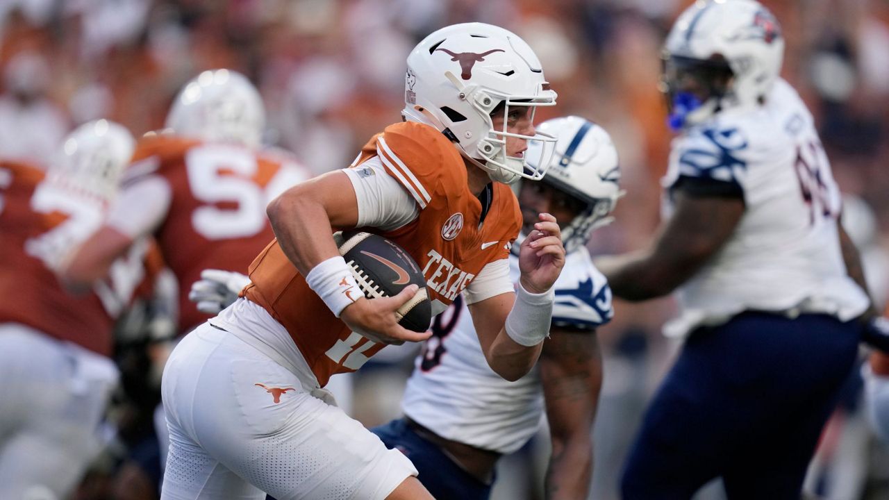 Texas quarterback Arch Manning (16) runs for a 67-yard touchdown against UTSA during the first half of an NCAA college football game in Austin, Texas, Saturday, Sept. 14, 2024. (AP Photo/Eric Gay)