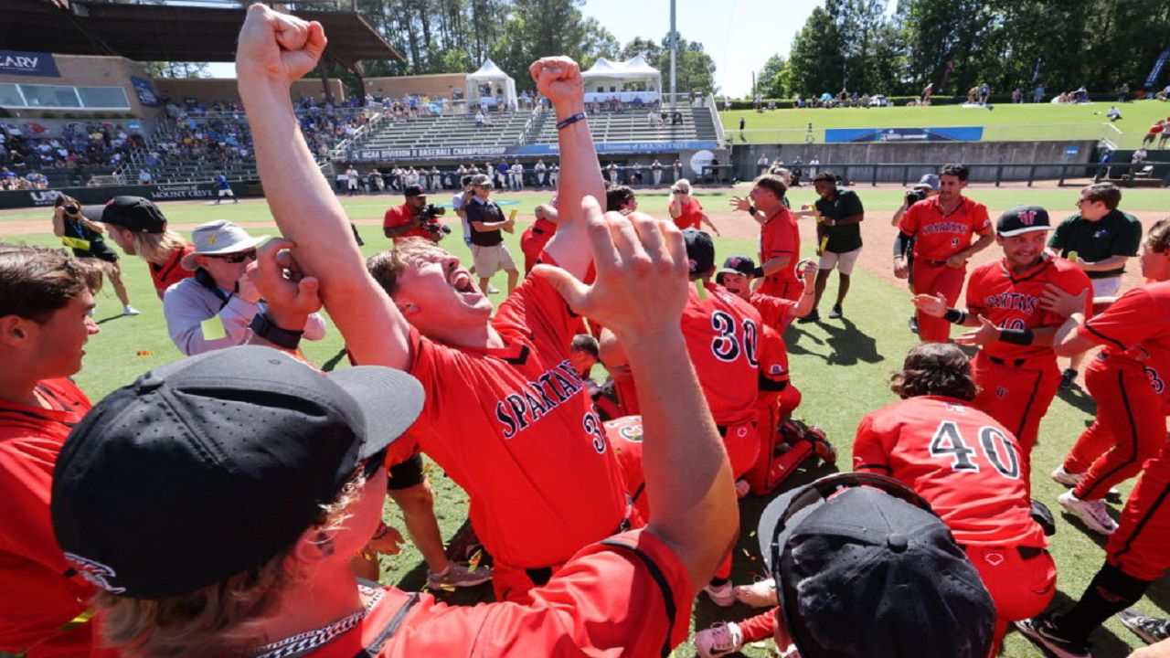 University of Tampa baseball players celebrate the team's 8-3 win against Angelo State Saturday in Cary, N.C. The win earned the UT program its 9th national championship in baseball. (Courtesy University of Tampa)