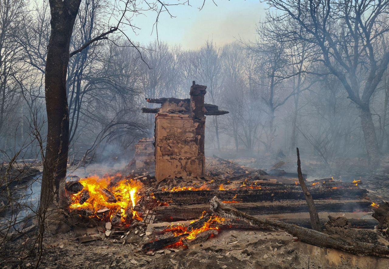 Ukraine continues to battle forest fire near Chernobyl