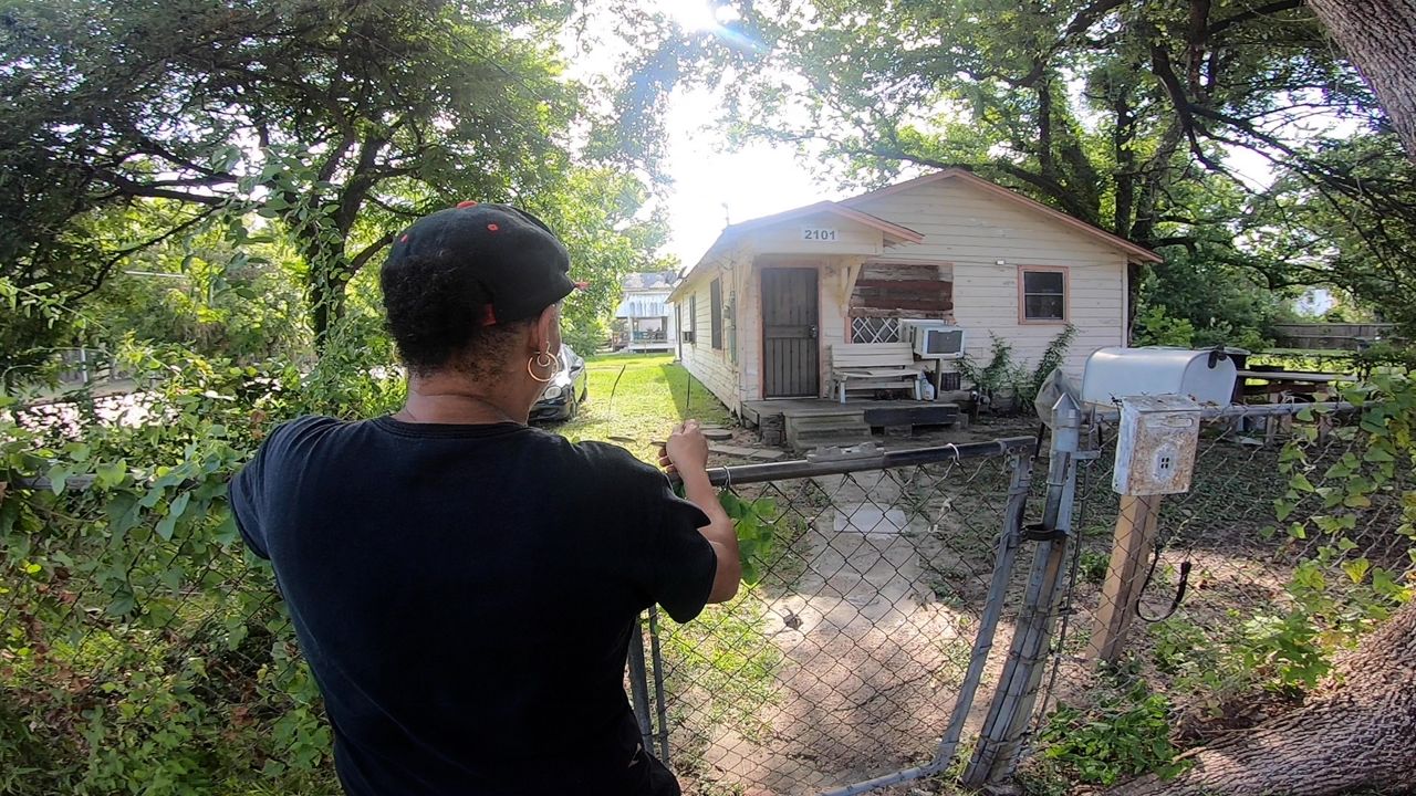 Matthews says her family has lived in and around this home since 1972 and for members of this long-standing Black and Latino community, moving would be devastating. (Spectrum News 1/Dylan Scott)