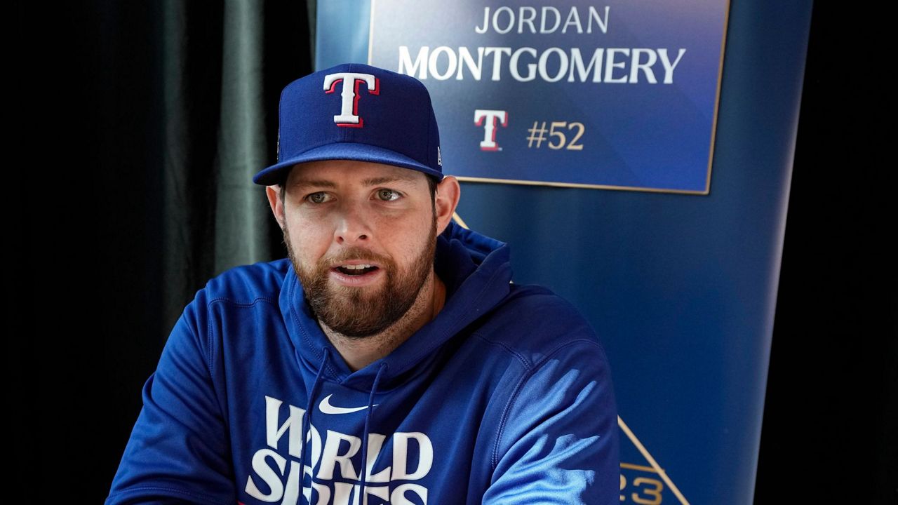 Texas Rangers pitcher Jordan Montgomery answers a question during a World Series baseball media day Thursday, Oct. 26, 2023, in Arlington, Texas. The Rangers will play the Arizona Diamondbacks in Game 1 of the World Series tomorrow. (AP Photo/Tony Gutierrez)