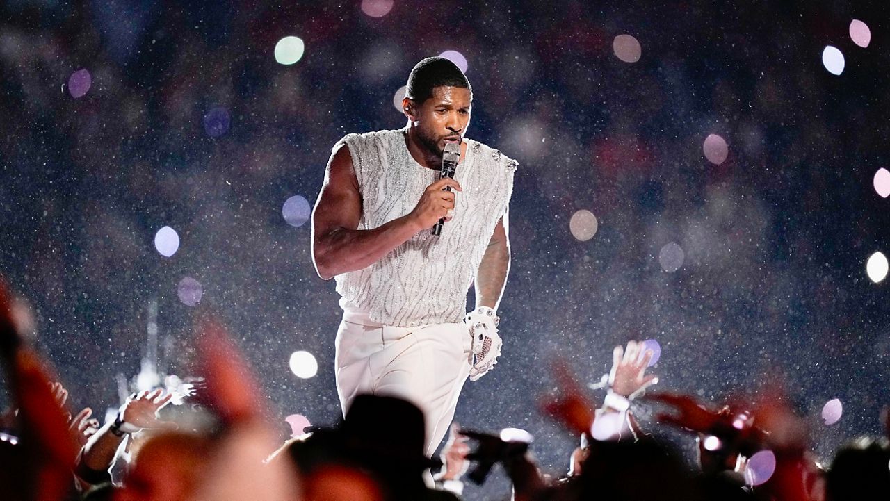 Usher performs during halftime of the NFL Super Bowl 58 football game Sunday between the San Francisco 49ers and the Kansas City Chiefs in Las Vegas. (AP Photo/Brynn Anderson)