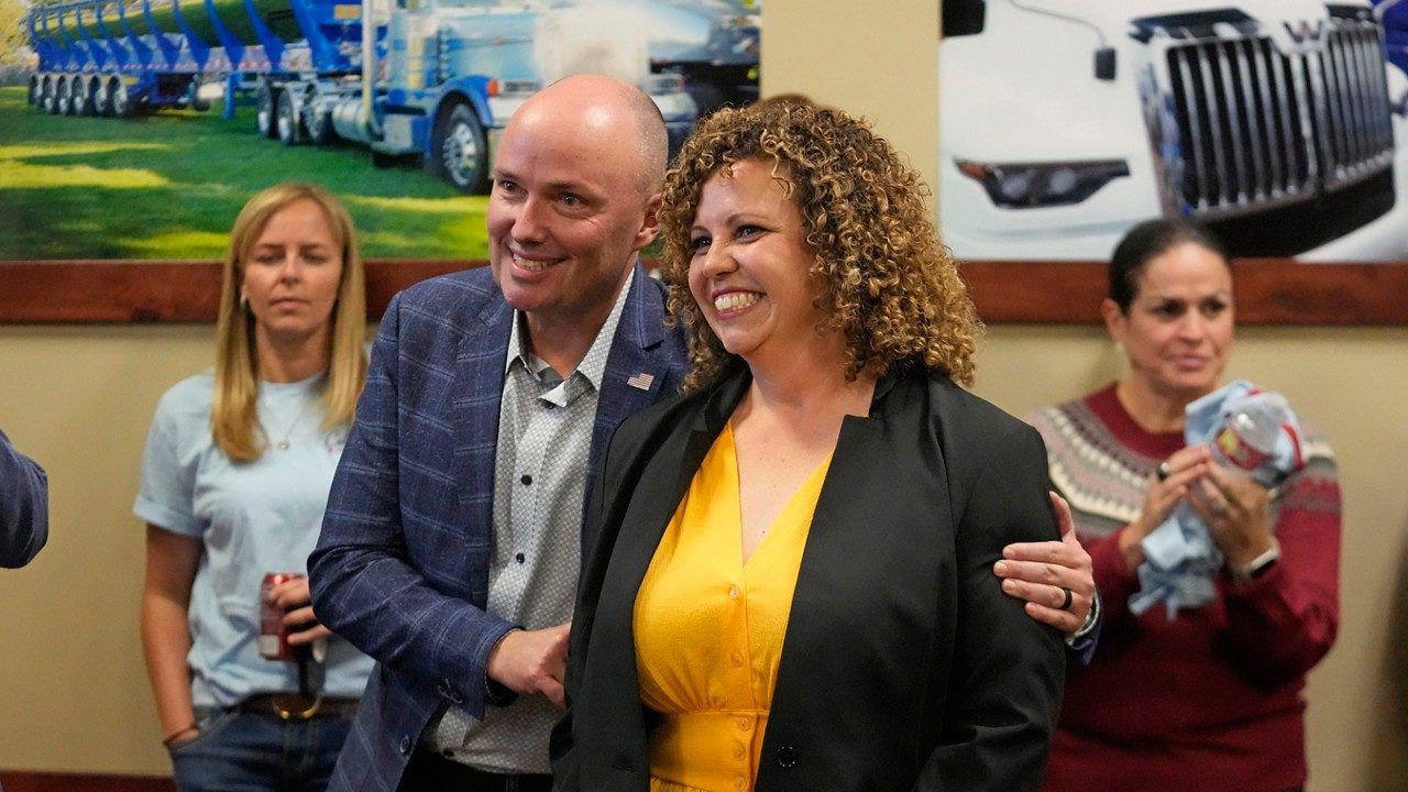 Utah 2nd Congressional District Republican Celeste Maloy receives a hug from Utah Gov. Spencer Cox after winning a Utah special election to replace her former boss Rep. Chris Stewart during an election night party, Tuesday, Nov. 21, 2023, in West Valley City, Utah. (AP Photo/Rick Bowmer)