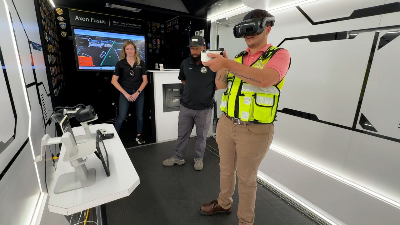 Law enforcement looks at high tech gear at Axon Roadshow