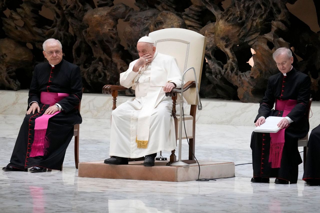 An ailing Pope Francis appears at a weekly audience but says he's not ...