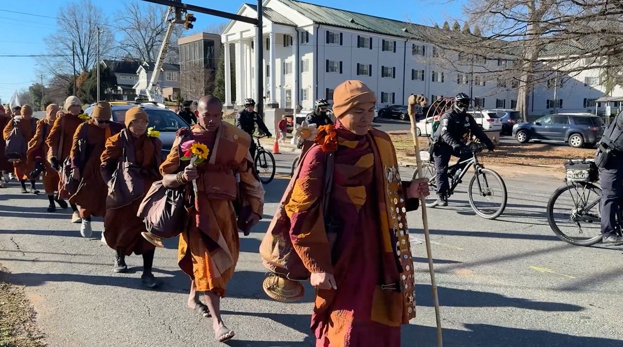 Monks walk for peace through Charlotte en route to D.C.