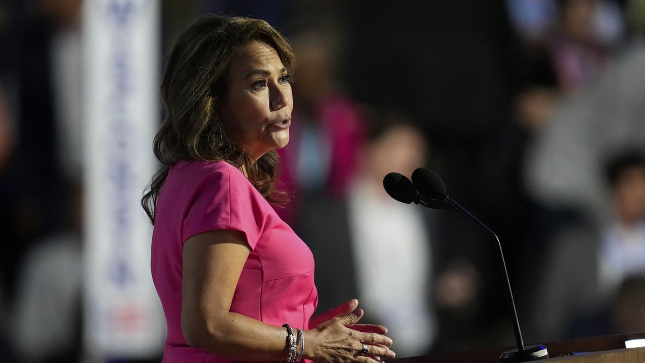 Rep. Veronica Escobar, D-Texas, walks during the Democratic National Convention Wednesday, Aug. 21, 2024, in Chicago. (AP Photo/Erin Hooley)