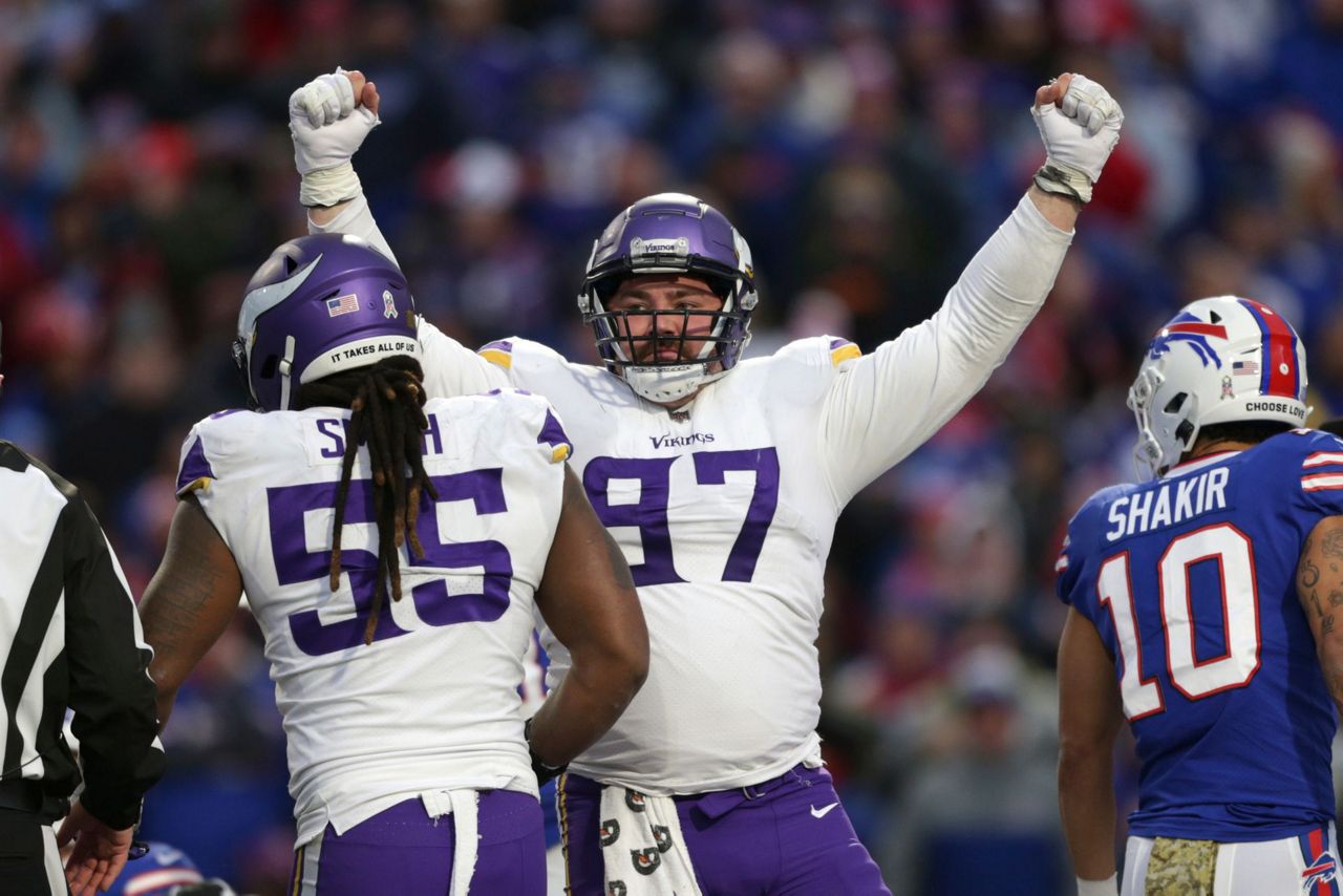 Buffalo Bills wide receiver Stefon Diggs (14) is brought down by Minnesota  Vikings linebacker Eric Kendricks (54) in the first half of an NFL football  game, Sunday, Nov. 13, 2022, in Orchard