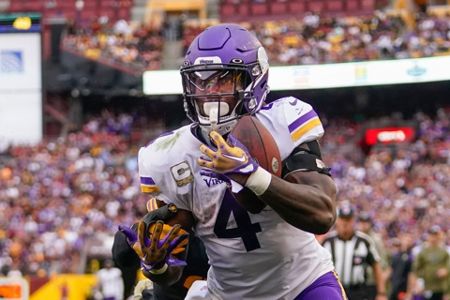 Washington Commanders defensive back Kamren Curl (31) looks to