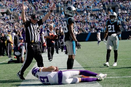 Cousins throws TD pass in OT; Vikings beat Panthers 34-28