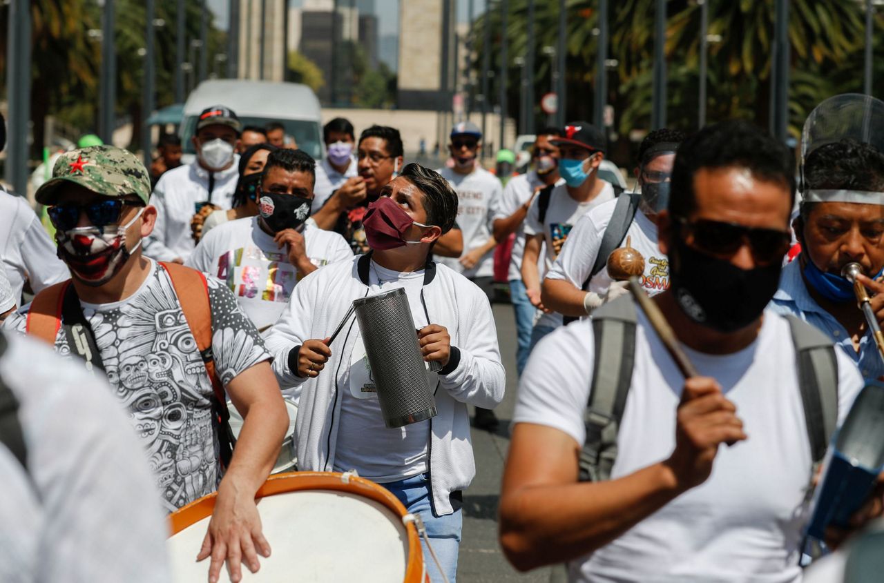 Mexico virus cases, deaths continue high, reopening remote