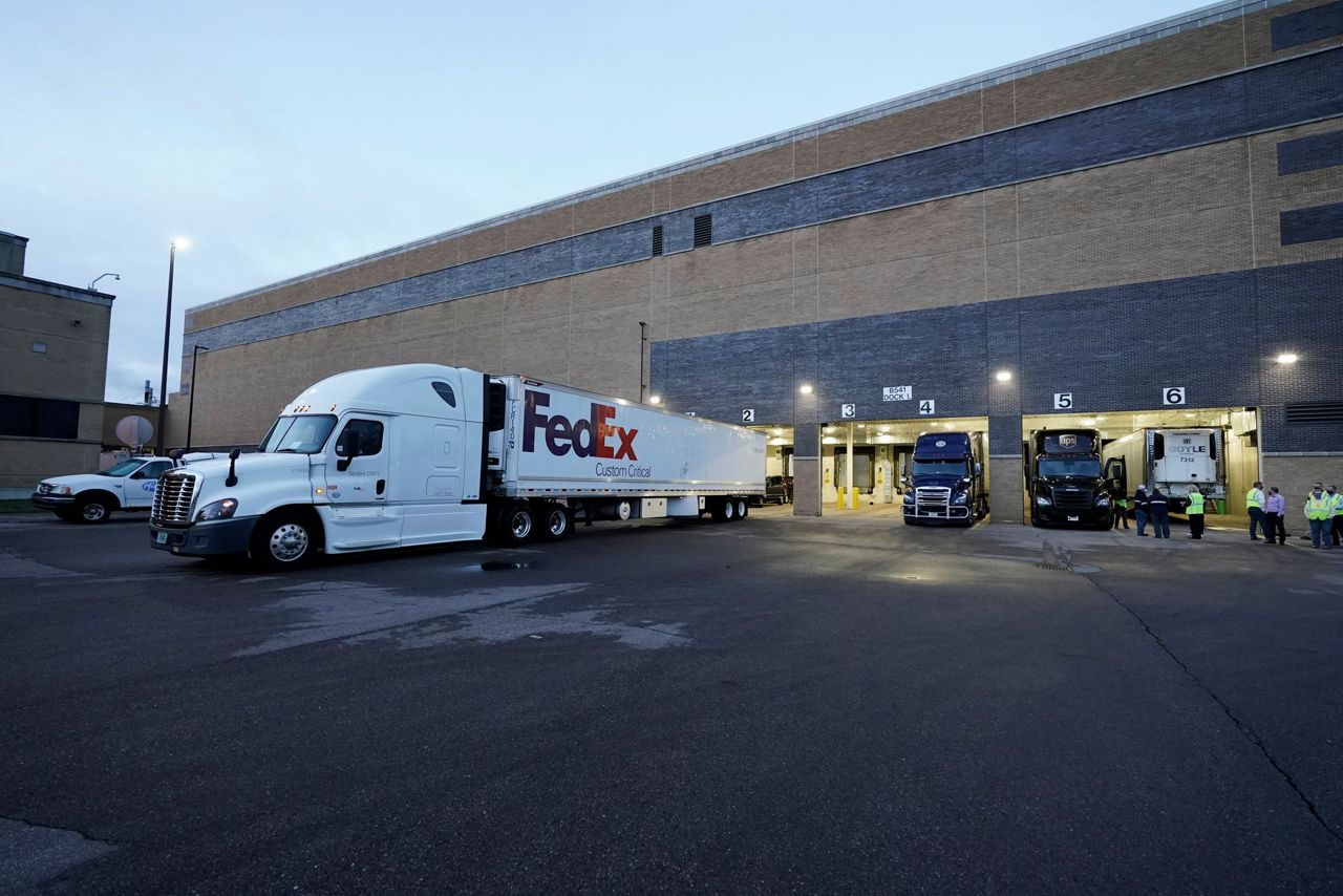 Trucks with first COVID-19 vaccine in US get ready to roll