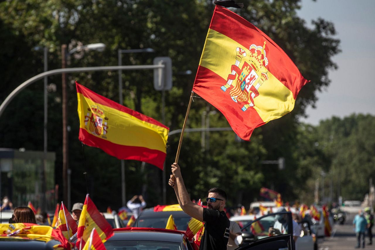 Spain’s far-right holds car protest against virus lockdown