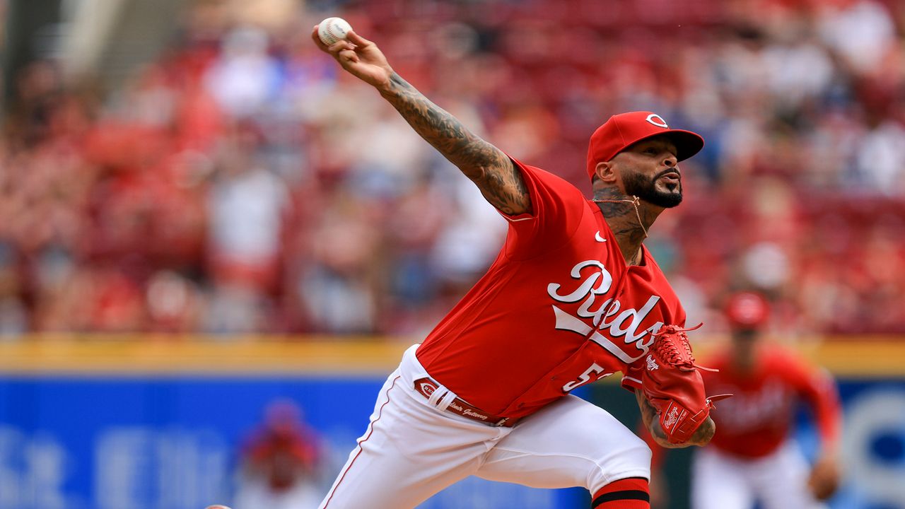 Vladimir Gutierrez throws during the first inning of a baseball game against the San Francisco Giants in Cincinnati, May 28, 2022 with one of his former teams, the Reds. (AP Photo/Aaron Doster, File)