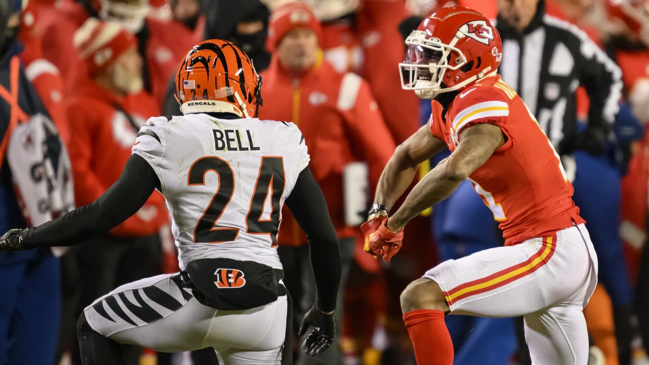 Kansas City Chiefs wide receiver Marquez Valdes-Scantling (11) celebrates a first down catch against Cincinnati Bengals safety Vonn Bell (24) during during the second half of the NFL AFC Championship playoff football game, Sunday, Jan. 29, 2023 in Kansas City, Mo. (AP Photo/Reed Hoffmann)