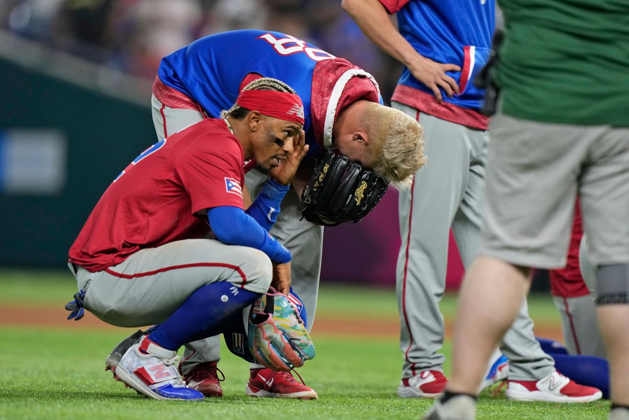 Yadier Molina celebrates Team Puerto Rico's victory - 3/15/13