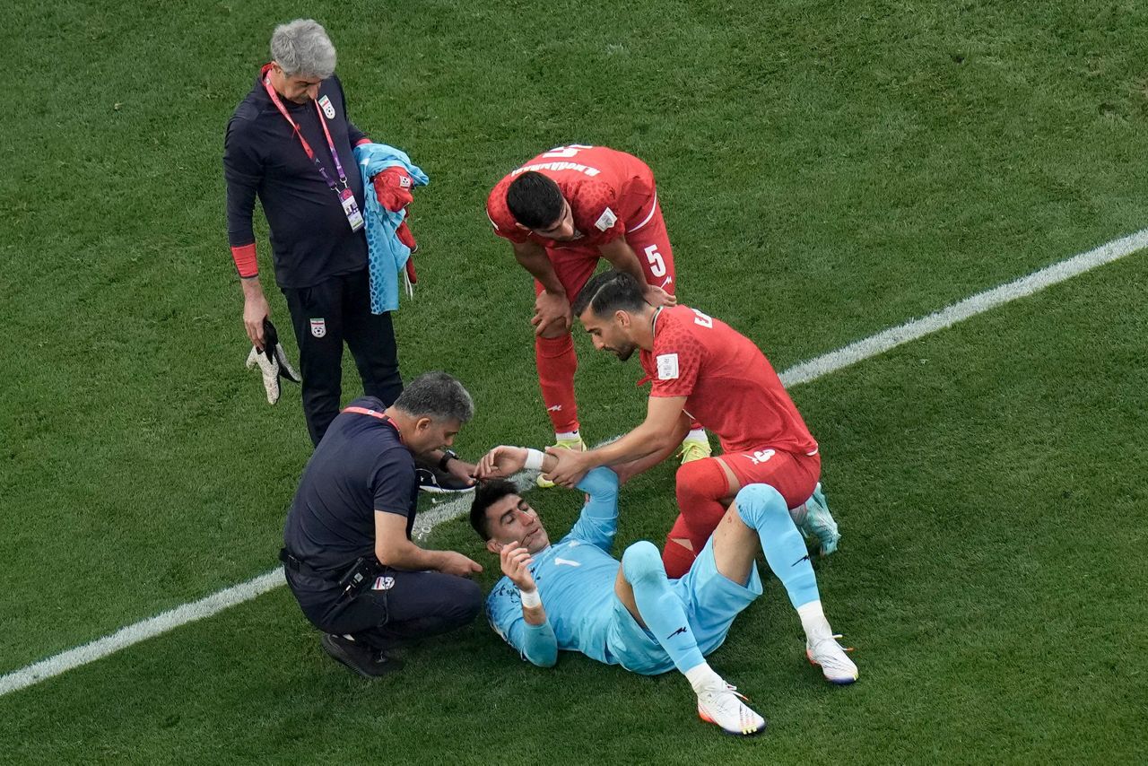 Iran goalkeeper clashes heads with teammate at World Cup