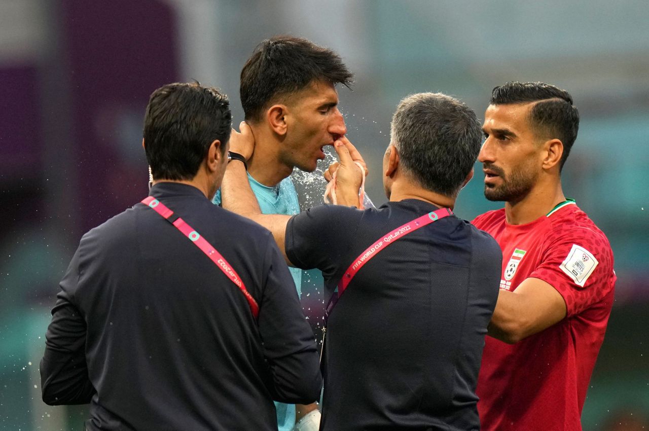 Iran goalkeeper clashes heads with teammate at World Cup