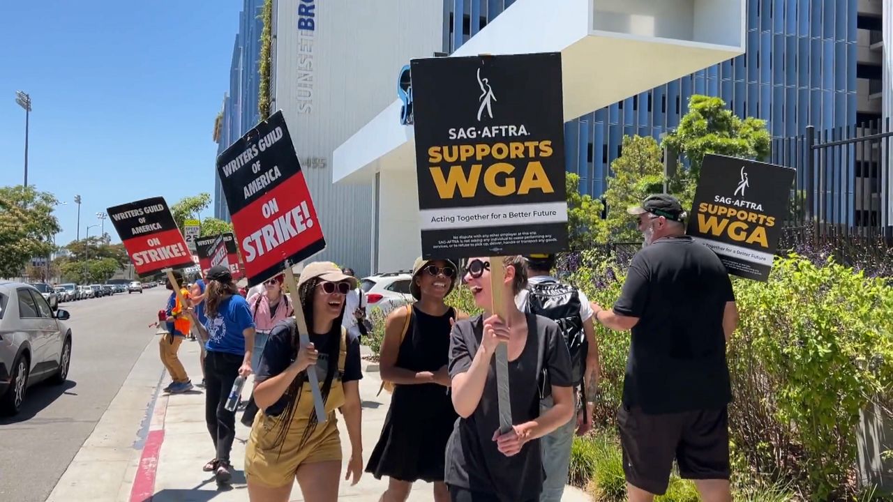 SAG-AFTRA, WGA members support one another amid strikes