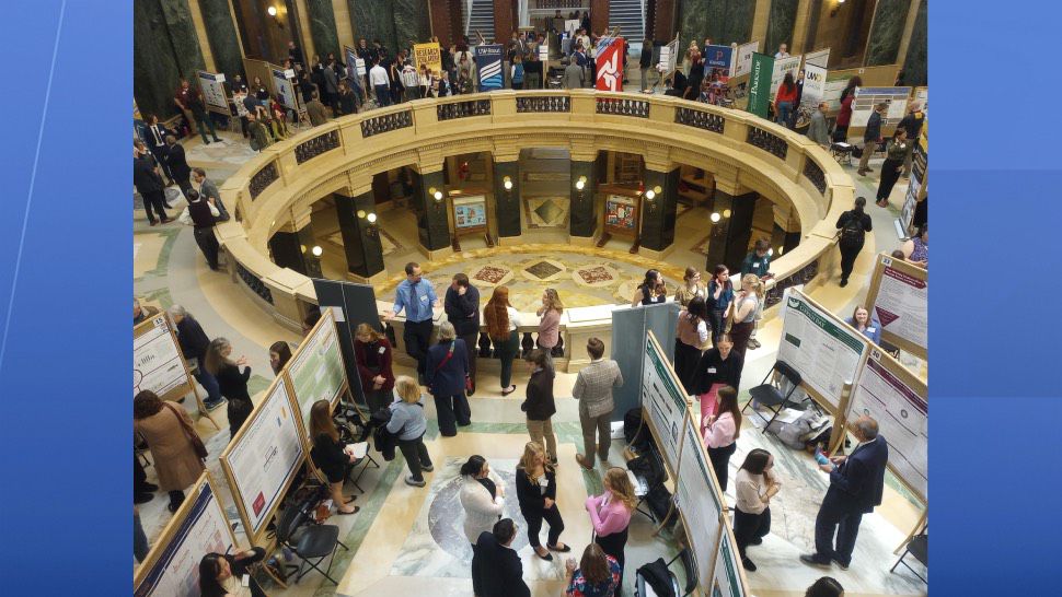 Undergraduate Students from UW Schools gather in the Capitol Rotunda. 