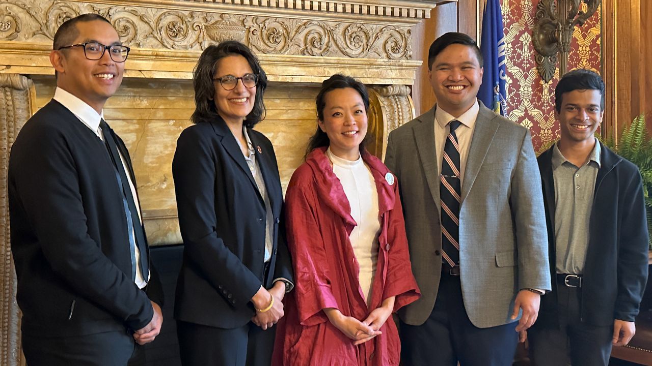 Representatives and staff gather for the launch of the newly created Wisconsin Legislative Asian Caucus. (Spectrum News 1/Anthony DaBruzzi)