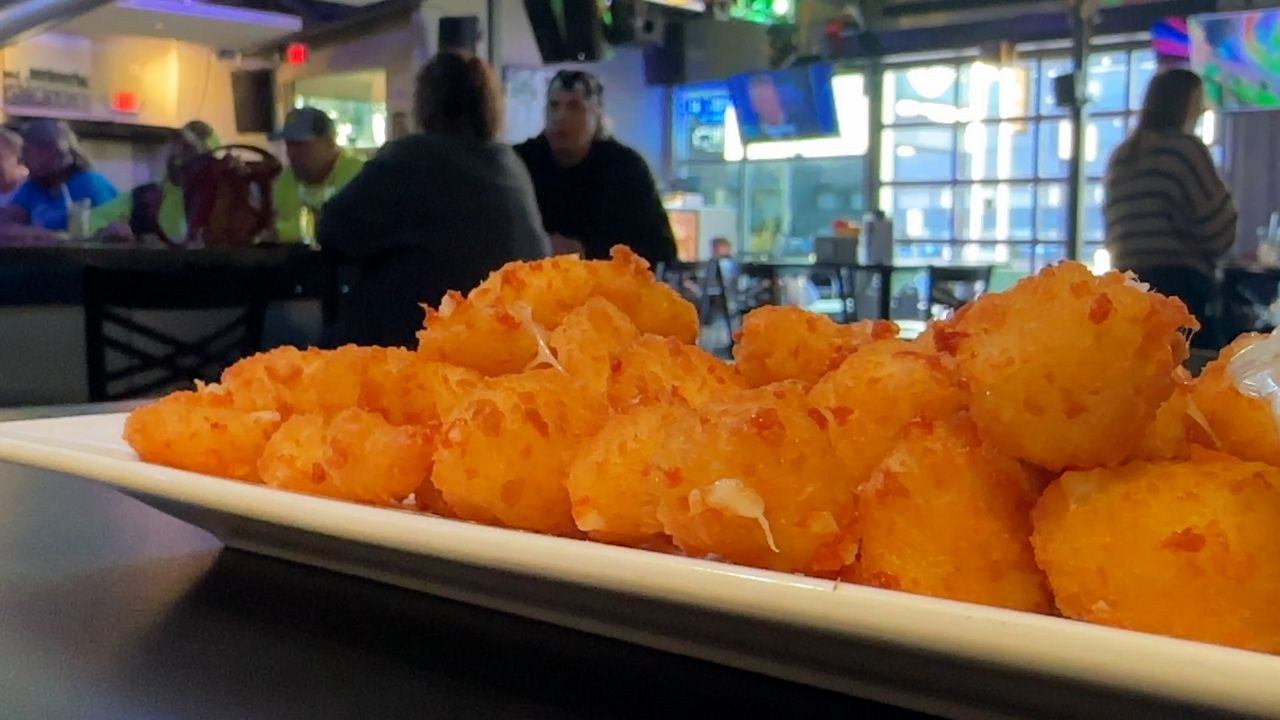 Discover Green Bay is spotlighting Wisconsin's favorite cheese snack by launching its Cheese Curd Trail mobile passport