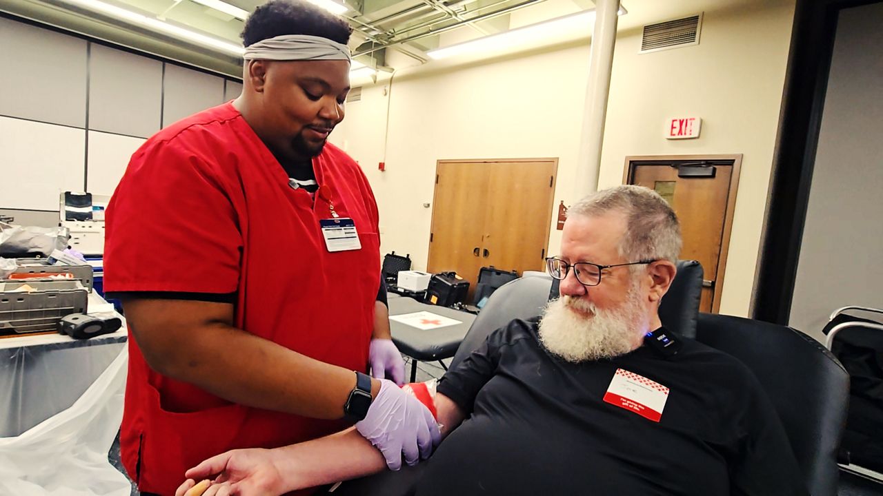  Larry Robinson, a phlebotomist with the American Red Cross Southwest Wisconsin Chapter, was inspired to join the field after a blood donation saved his son's life.