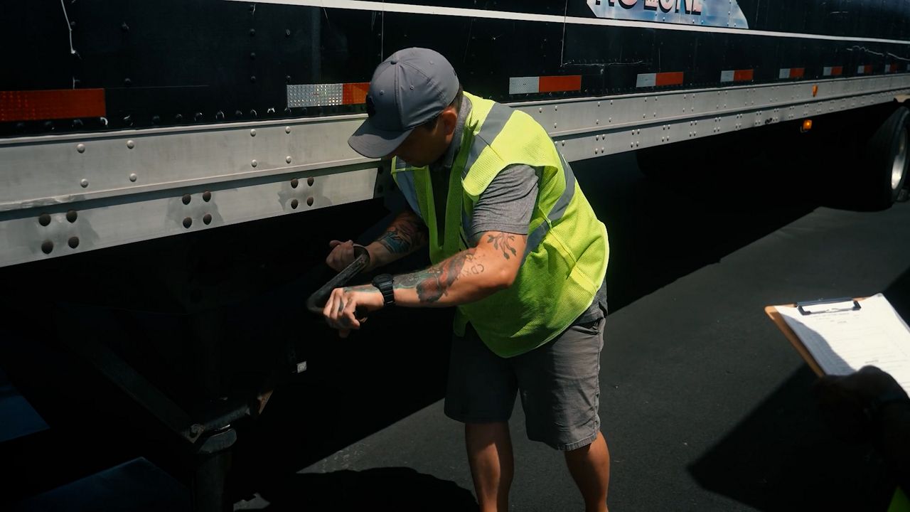 A new federal grant could put more North Carolinians behind the trucking wheel