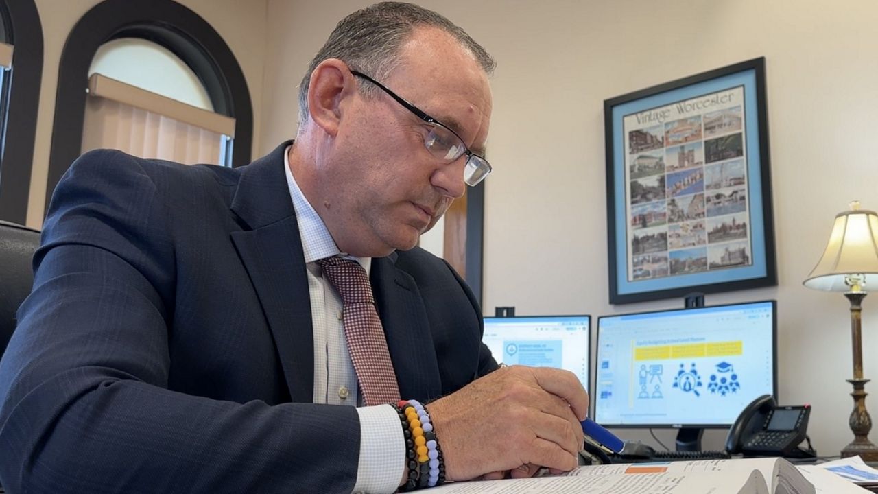 Brian Allen in his office. (Spectrum News 1/Cam Jandrow)
