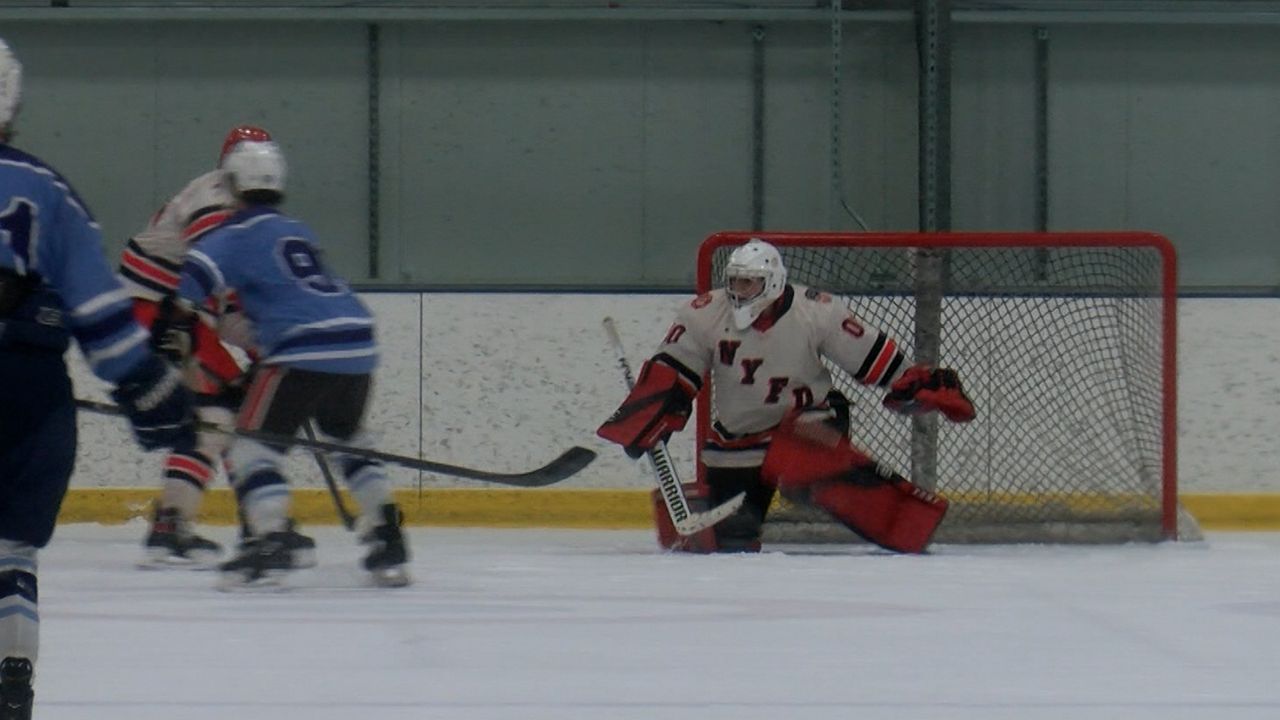 A goaltender with the New York City Fire Department keeps an eye on the action during 'Skate to Remember the Worcester 6' on Sunday. (Spectrum News 1/Devin Bates)